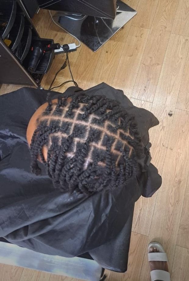 Client in the salon chair with two-strand twists