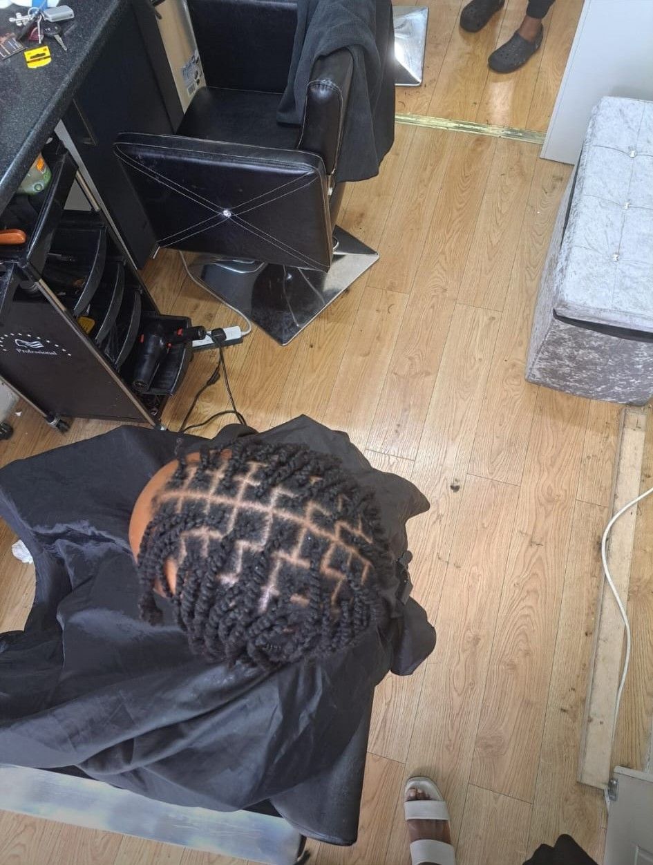 Client in the salon chair with two-strand twists